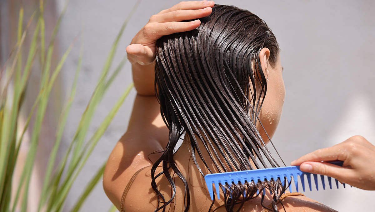 Young,Female,Model,Putting,Refreshing,Mask,On,Long,Wet,Hair