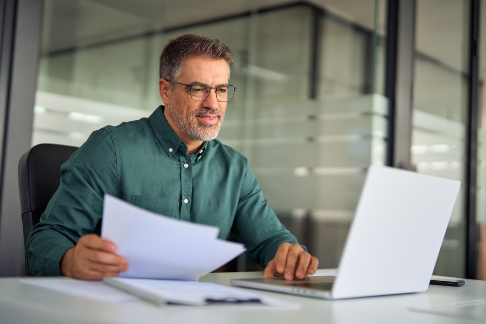 Smiling,Middle,Aged,Executive,,Mature,Male,Hr,Manager,Holding,Documents