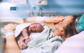 Mother,And,Newborn.,Child,Birth,In,Maternity,Hospital.,Young,Mom