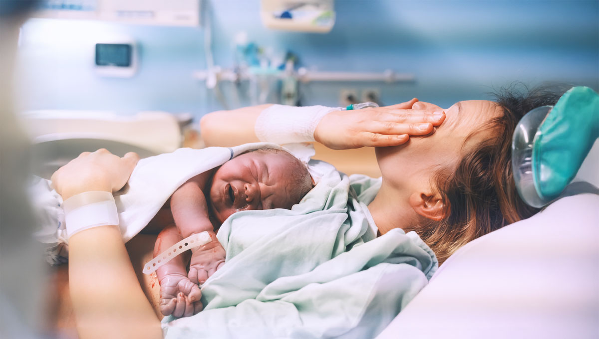 Mother,And,Newborn.,Child,Birth,In,Maternity,Hospital.,Young,Mom